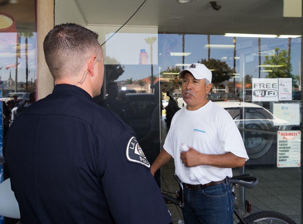 Residents met with officers and talked about neighborhood concerns at the monthly Coffee with a Cop event. Photo by Jim Banks/Behind the Badge OC. 