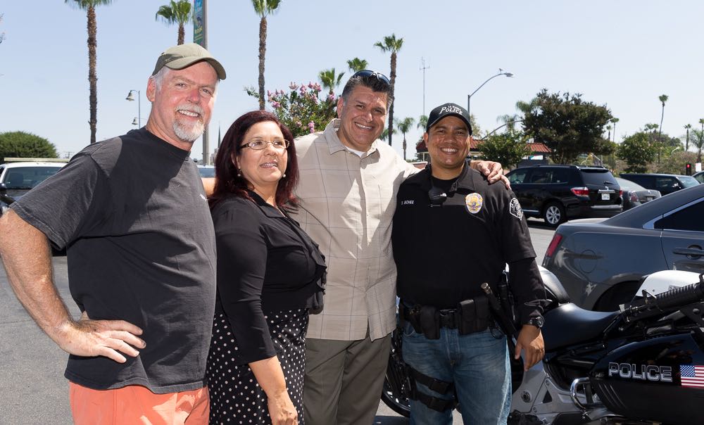 Lt. Mel Ruiz, second from right, started the Coffee with a Cop events as a community outreach effort. Photo by Jim Banks/Behind the Badge OC. 