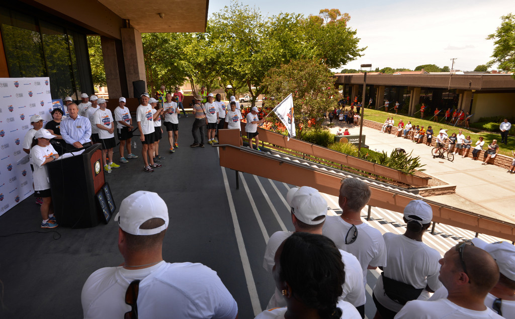 Torch runners from the Law Enforcement Torch Run Final Leg for Special Olympics gather on the steps of the Cypress Civic Center. Photo by Steven Georges/Behind the Badge OC