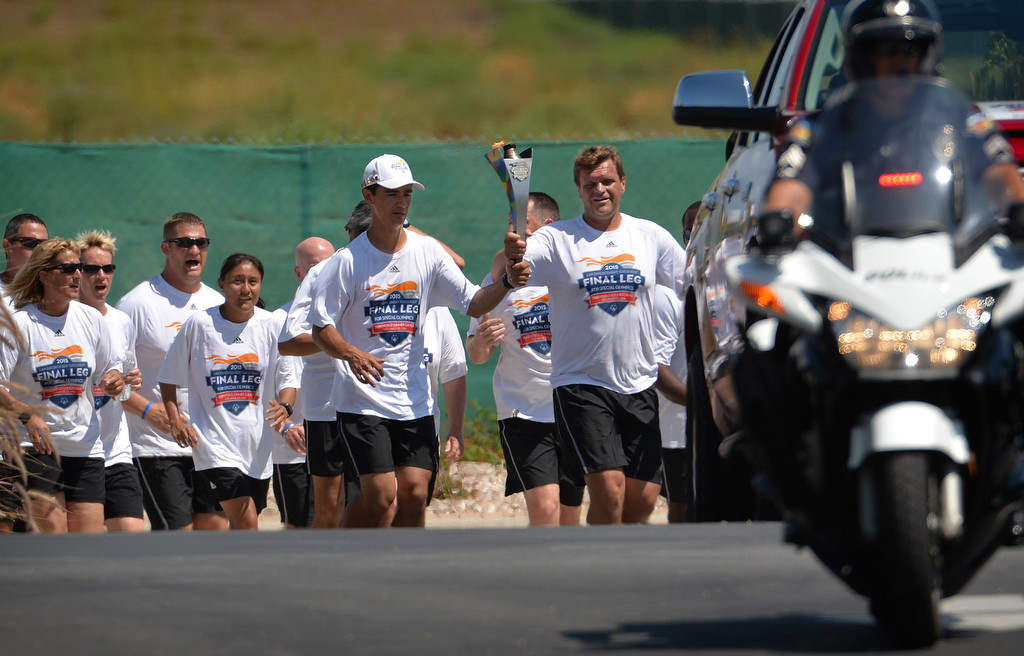 Runners from the Law Enforcement Torch Run Final Leg for Special Olympics arrive at the Orange County Sheriff Training Academy in Tustin for a ceremony hosted by the Tustin PD. Photo by Steven Georges/Behind the Badge OC