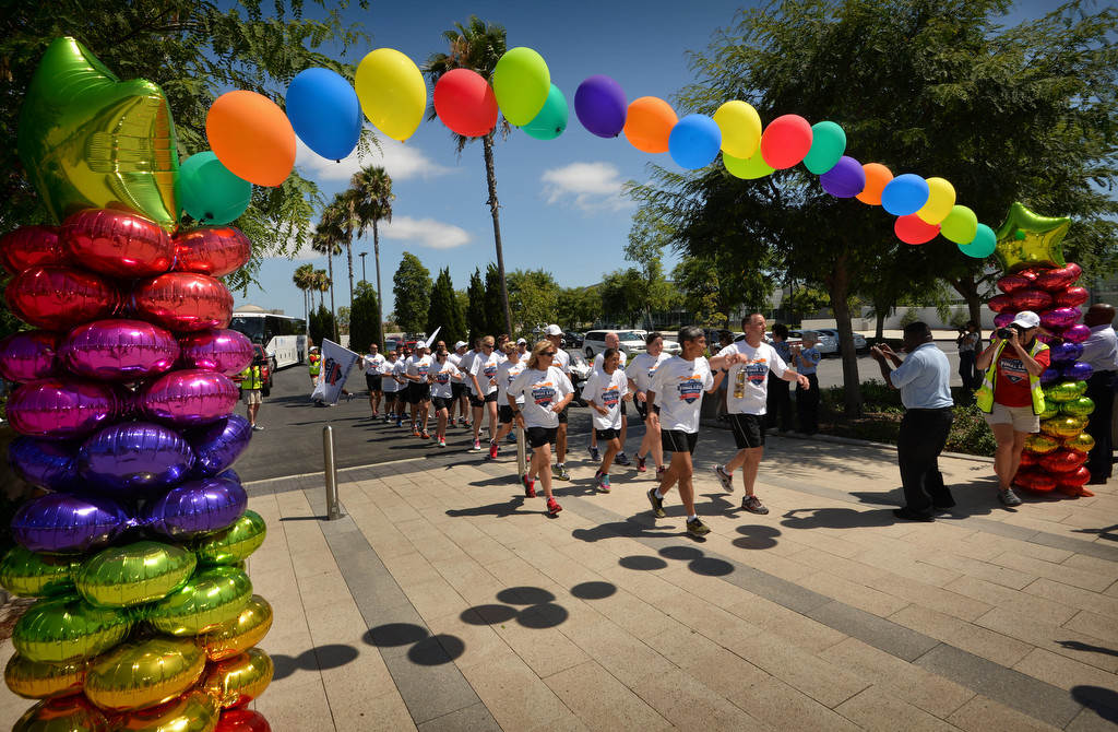 Runners from the Law Enforcement Torch Run Final Leg for Special Olympics arrive at the Orange County Sheriff Training Academy in Tustin for a ceremony hosted by the Tustin PD. Photo by Steven Georges/Behind the Badge OC