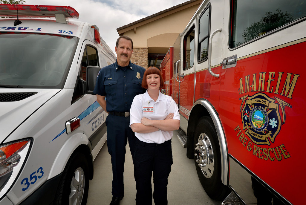 Captain Scott Fox, a paramedic with Anaheim Fire & Rescue and Nurse Practitioner Victoria Morrison of the City of Anaheim stand in front of AnaheimÕs new CCRU-1, (Community Care Response Unit) left, from Anaheim Fire & Rescue and CARE Ambulance. The new vehicle, where deployed and staffed by a paramedic and a nurse practitioner, will free up fire trucks and engines from having to respond to every medical call keeping them available for fire suppression and other more critical advance life service calls. Photo by Steven Georges/Behind the Badge OC