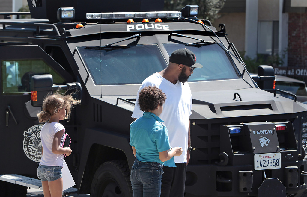 Visitors to the Cypress Community Festival had the opportunity to get a close-up view of the West County SWAT vehicle. The vehicle is shared by Cypress, Fountain Valley, Los Alamitos, Seal Beach and Westminster Police Departments. Photo by Christine Cotter/Behind the Badge OC