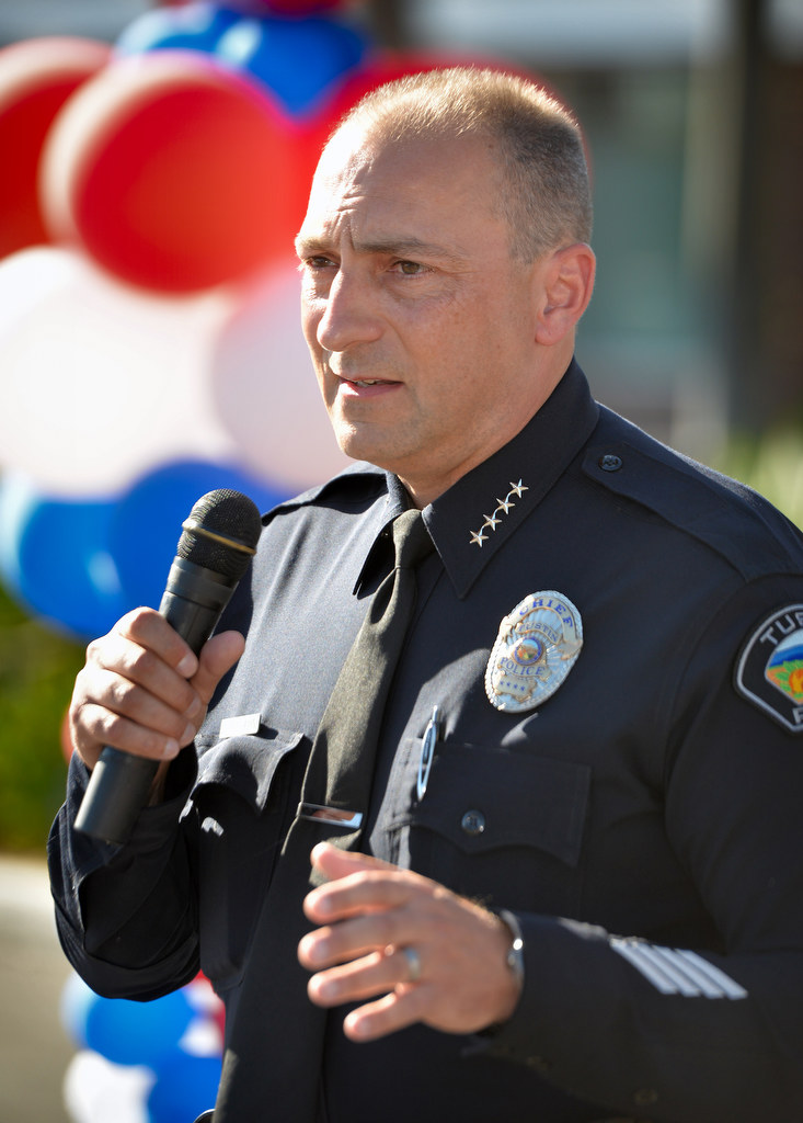 Tustin Police Chief Charles Celano welcomes everyone to the start of Tustin PD’s National Night Out as he talks about how crime has no place in the city. Photo by Steven Georges/Behind the Badge OC