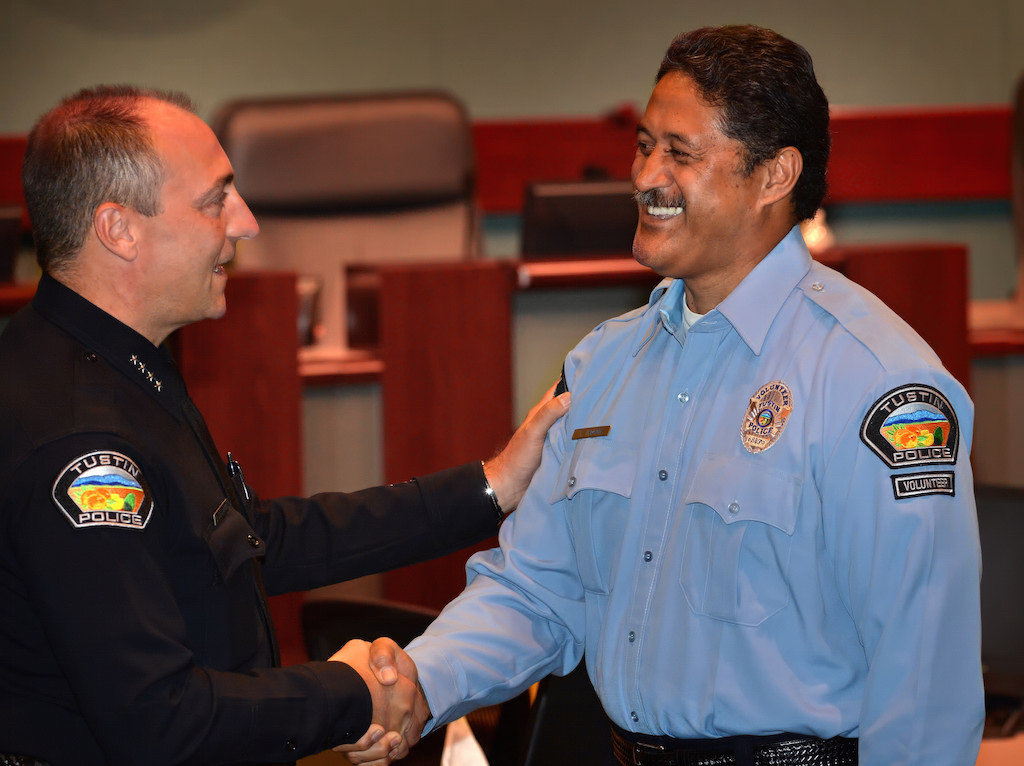 Tustin Police Chief Charles Celano welcomes Tupua  Ioane as a new volunteer for the Tustin PD. Ioane, who has four sons and fifteen grandchildren, has made Tustin his home for the past 30 years.