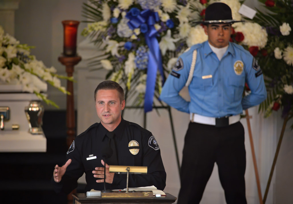 Buena Park PD Officer Joey Hoover talks about Buena Park Explorer Vince Parra during a memorial service for Parra at Forest Lawn. Photo by Steven Georges/Behind the Badge OC