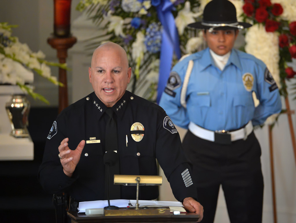 Buena Park Police Chief Corey Sianez talks about how Vince Parra, an 18-year-old Buena Park Explorer who passed away from cancer, inspired his fellow explorers, during a memorial service for Parra at Forest Lawn Memorial Park in Cypress. Photo by Steven Georges/Behind the Badge OC