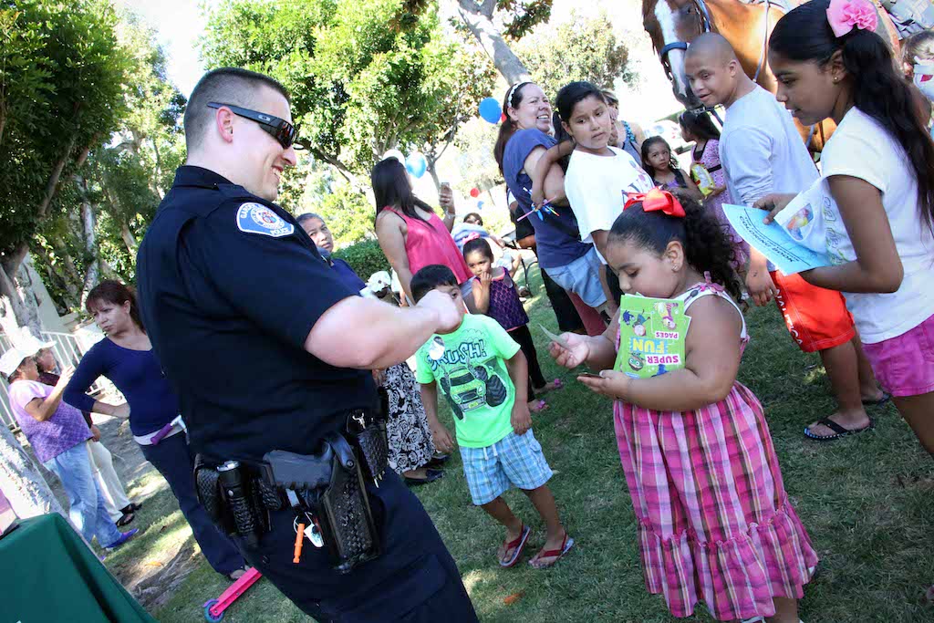 Garden Grove PD Officer Mitchel Mosser mingles with some kids. Photo by Van Vu, GGPD