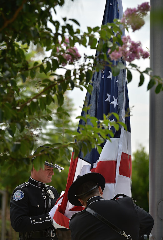 The Westminster Police Honor Guard raises the flag during Westminster’s 9/11 Remembrance ceremony at the Sid Goldstein Freedom Park. Photo by Steven Georges/Behind the Badge OC