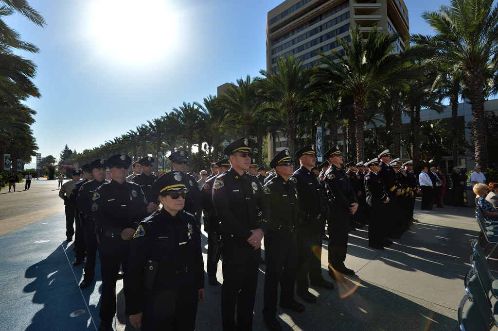 Anaheim Police, left, and Anaheim Fire & Rescue stand during the 2015 9/11 Remembrance Ceremony at Anaheim Grand Plaza. Photo by Steven Georges/Behind the Badge OC