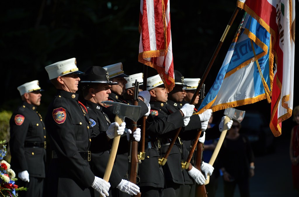 The joint Honor Guard from Anaheim Fire & Rescue and Anaheim Police post the colors at the start of the 2015 9/11 Remembrance Ceremony at Anaheim Grand Plaza. Photo by Steven Georges/Behind the Badge OC