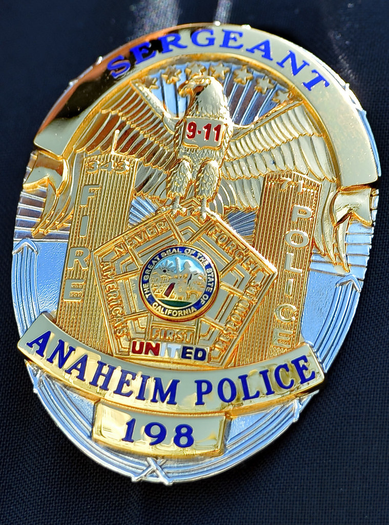 A special 9/11 police badge worn only in the month of September by a few Anaheim police officers, including this one worn by Sgt. Jake Gallacher. Photo by Steven Georges/Behind the Badge OC