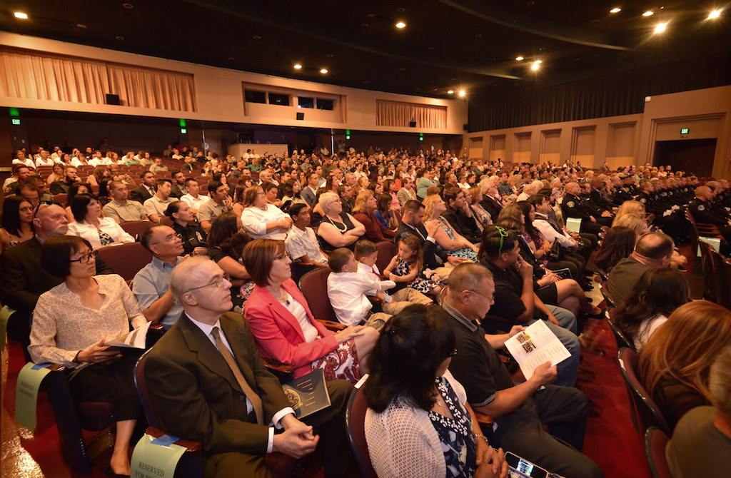 Family members and friends of Golden West College Criminal Justice Training Center graduates fill the Robert B. Moore Theater at Orange Coast College. Photo by Steven Georges/Behind the Badge OC