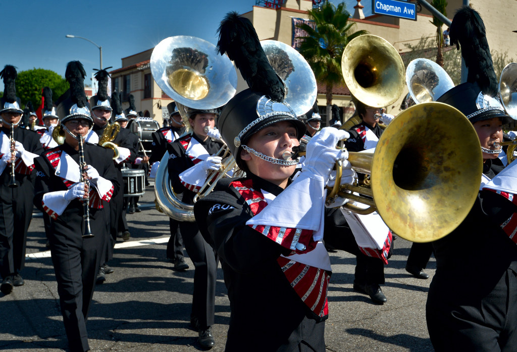 The Troy High School Marching Band marches down Harbor Blvd. during the Founders Day Parade. Photo by Steven Georges/Behind the Badge OC