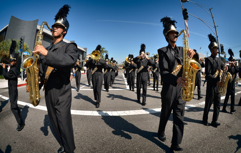 The Sunny Hills High School Marching Band play as they march down Harbor Blvd. during the Founders Day Parade in Fullerton. Photo by Steven Georges/Behind the Badge OC