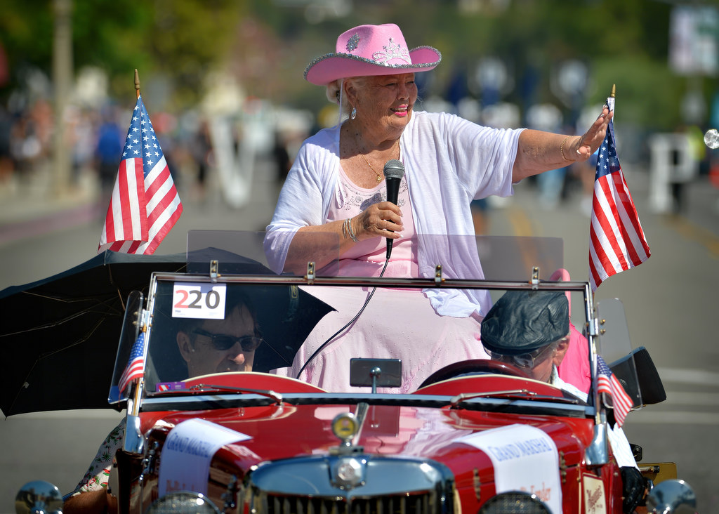 Phyllis Fender (of the Fender guitar family) waves to people as the grand marshal (one of two) of the Founders Day Parade in Fullerton. Photo by Steven Georges/Behind the Badge OC