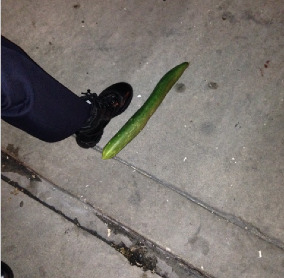 A large cucumber was found next to a man down on the sidewalk. Photo courtesy John Roman. 