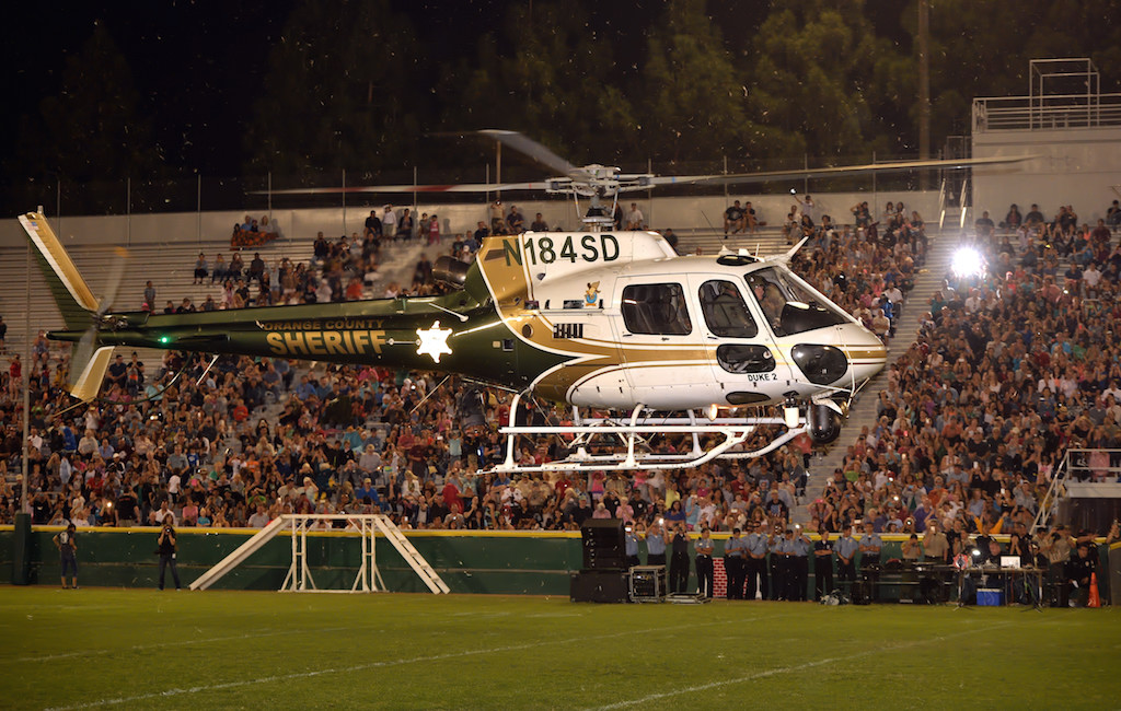 An Orange County Sheriff helicopter passes over Glover Stadium during the OCPCA’s 27th Annual Police K-9 Benefit Show in Anaheim. Photo by Steven Georges/Behind the Badge OC