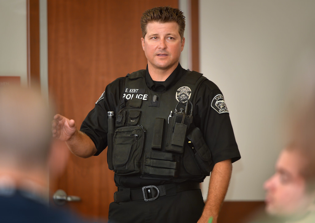 Tustin Officer Eric Kent talks to a citizens academy class about the Tustin Police K-9 Unit. Photo by Steven Georges/Behind the Badge OC