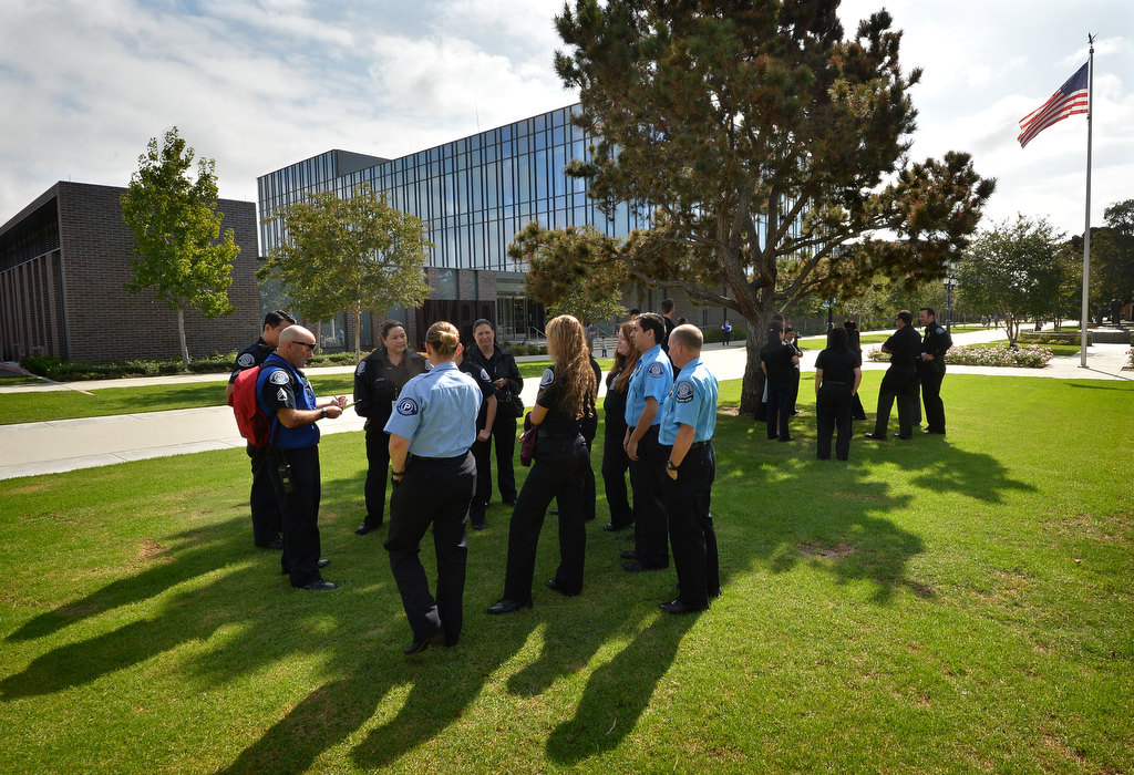 Members of the Westminster PD gather outside in a designated area before taking roll during the civic center’s earthquake drill. Photo by Steven Georges/Behind the Badge OC