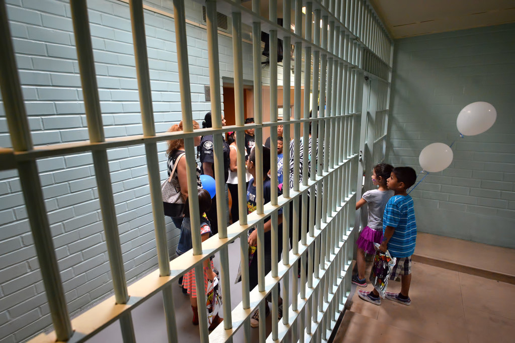 Kids get a first hand tour of the inside of a jail cell during La Habra PD’s open house. Photo by Steven Georges/Behind the Badge OC