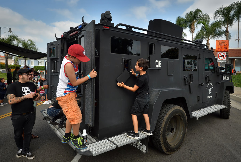 Kids get the opportunity to climb inside and around a North County SWAT truck during La Habra PD’s open house. Photo by Steven Georges/Behind the Badge OC