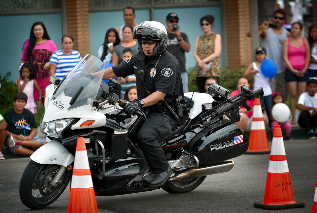 La Habra PD Officer Sumner Bohee displays his skills on a motorcycle during a demonstration, part of La Habra PD’s open house. Photo by Steven Georges/Behind the Badge OC