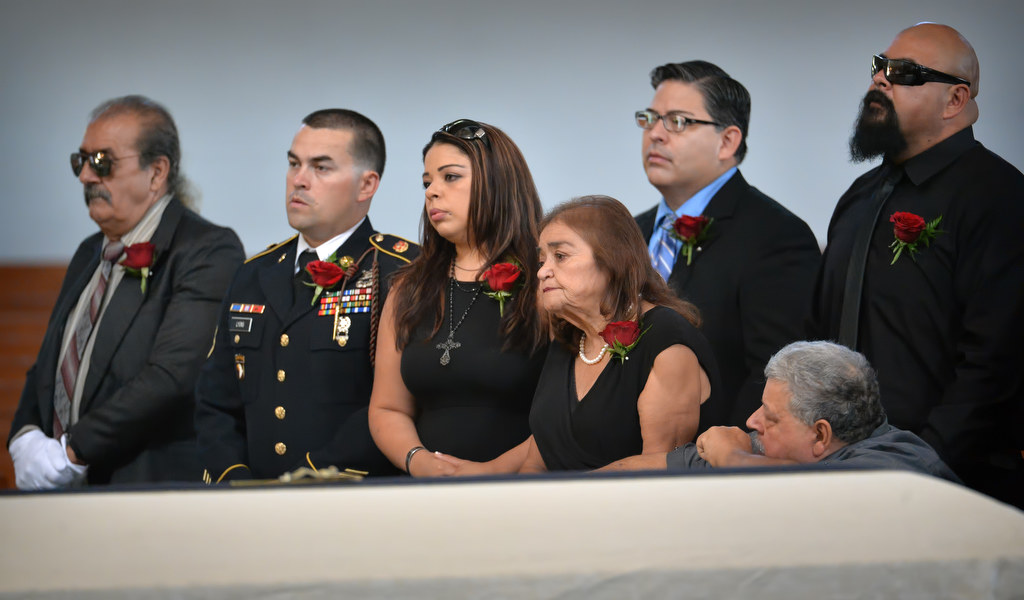 Family members attend the memorial service for Metro Net Dispatcher John Delgado at La Purisima Catholic Church in Orange. Photo by Steven Georges/Behind the Badge OC