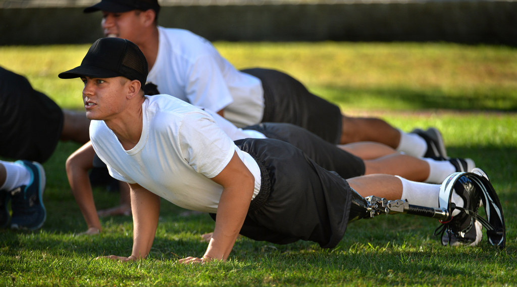 Correctional Services Assistant Recruit Robert Ram, who lost his left leg at age 12 due to cancer, works out with his classmates at the Orange County Sheriff’s Department Correctional Services Assistant (CSA) Academy. Photo by Steven Georges/Behind the Badge OC