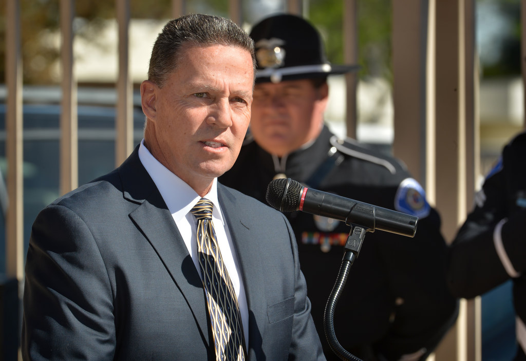 Former Garden Grove Police Chief Kevin Raney talks about his memories of Sgt. Bruce Beauchamp during a naming ceremony for the GGPD Bruce Beauchamp Juvenile Justice Center. Photo by Steven Georges/Behind the Badge OC