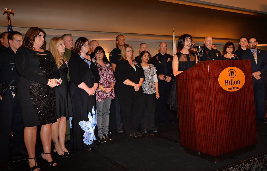 Heroes with Heart award recipients are gathered on stage at the Hilton Anaheim for recognition during the awards dinner. Photo by Steven Georges/Behind the Badge OC