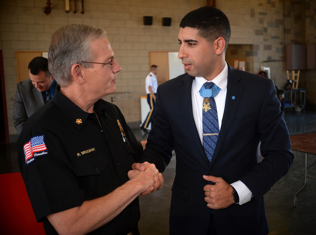 Anaheim Fire & Rescue Chief Randy Bruegman with Congressional Medal of Honor recipient Capt. Florent "Flo" Groberg during a visit to Anaheim Fire Station 3 on Saturday. Photo by Steven Georges/Behind the Badge OC