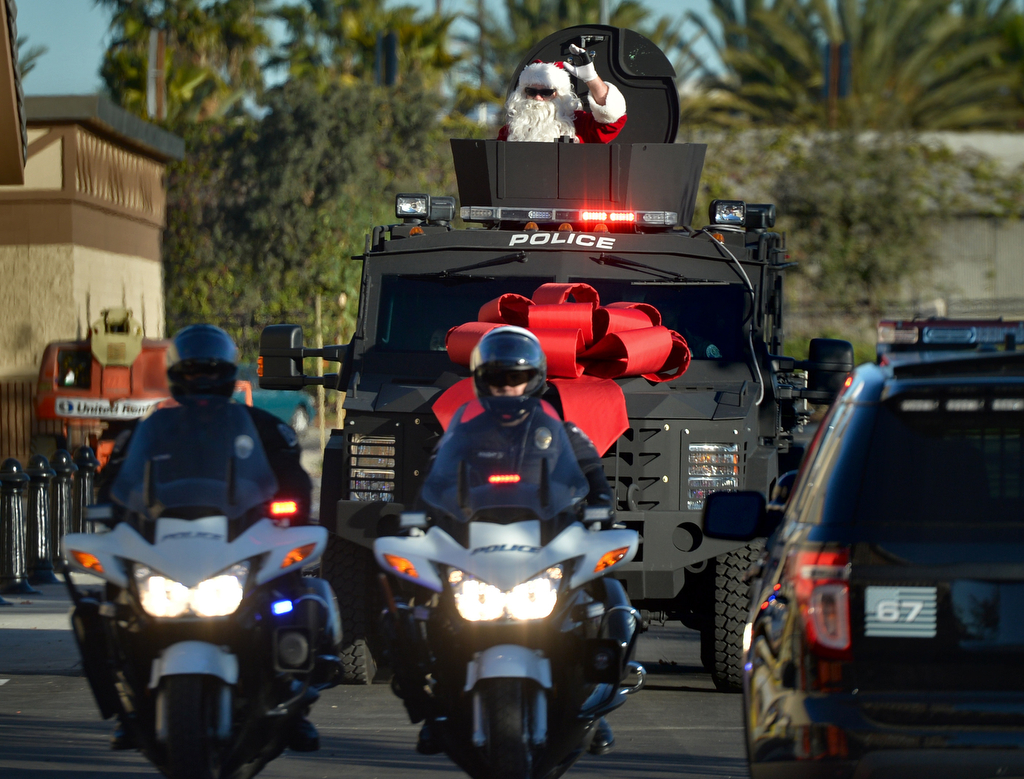 Santa arrives in a SWAT truck for Westminster PD’s annual Shop With a Cop event. Photo by Steven Georges/Behind the Badge OC