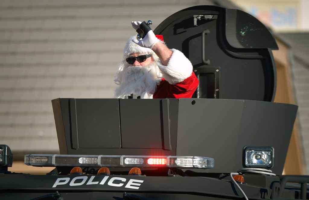 Santa arrives in a SWAT truck for Westminster PD’s annual Shop With a Cop event. Photo by Steven Georges/Behind the Badge OC