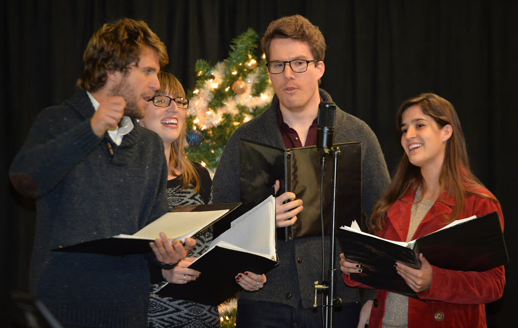 The Jollys, Nathan Kersey-Wilson, left, Sarah Remley, Bret Noel and Roxana Meyers, sing Christmas carols for the kids during the Burn Survivor’s Santa Jamboree at the Anaheim Convention Center. Photo by Steven Georges/Behind the Badge OC