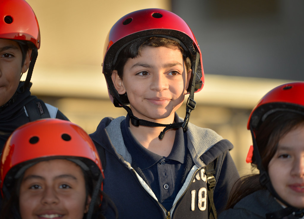 Kids from Ponderosa Elementary School in Anaheim wear their Anaheim Fire & Rescue bicycle helmets that were given to them. The free helmets were part of part of the Wear Your Helmet Like A Pro program. Photo by Steven Georges/Behind the Badge OC
