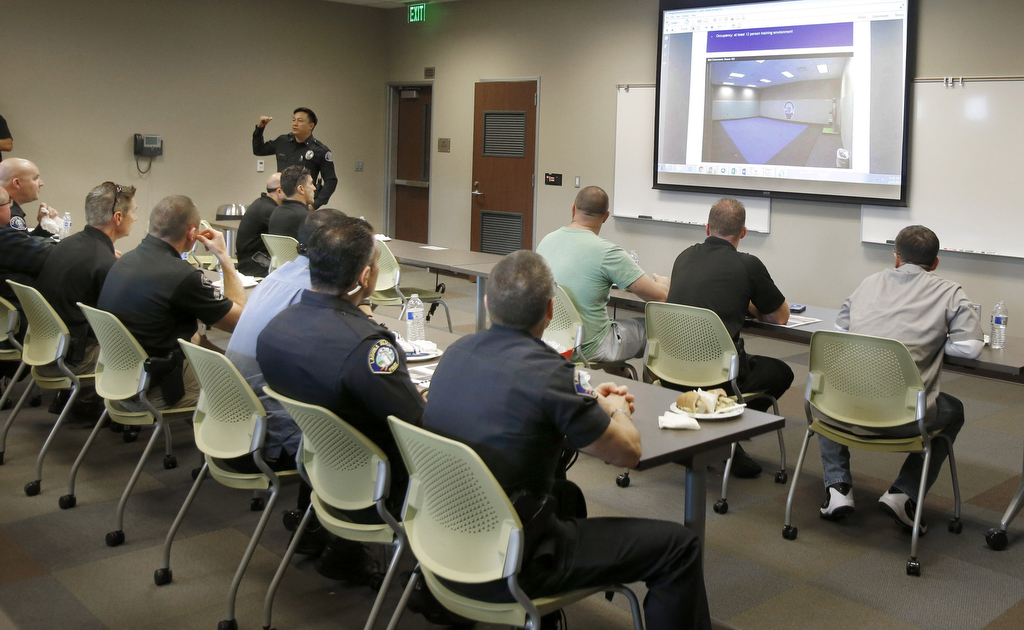 Westminster Police Department Commander Tim Vu leads an orientation meeting at their new gun range during a recent open house.  Photo by Christine Cotter/Behind the Badge OC