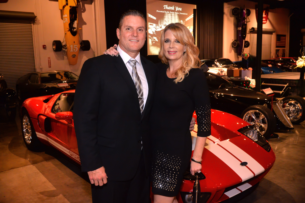 Tustin PD Sgt. Del Pickney with his wife, Michele, at the Marconi Automotive Museum. Photo by Steven Georges/Behind the Badge OC