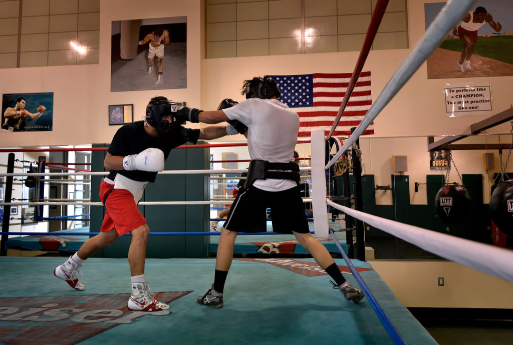 Matt Reily, left, and Antonio Garcia during a sparring session at the Anaheim Boxing Club. Photo by Steven Georges/Behind the Badge OC