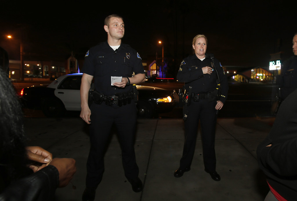 Anaheim Police Department Field Training Officer Kacey Costa and trainee Anthony McGlade make a stop along Beach Blvd. during a recent graveyard shift. Photo by Christine Cotter/Behind the Badge OC