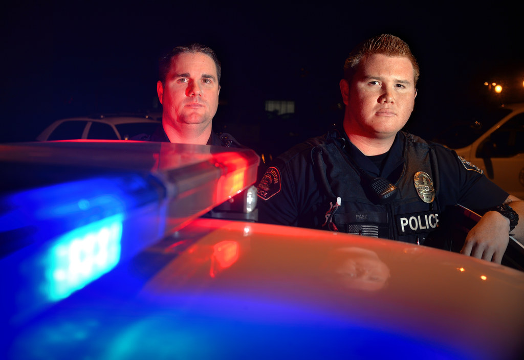 Fullerton PD officers Chris Murphy, left, and Jose Paez on night patrol. Photo by Steven Georges/Behind the Badge OC