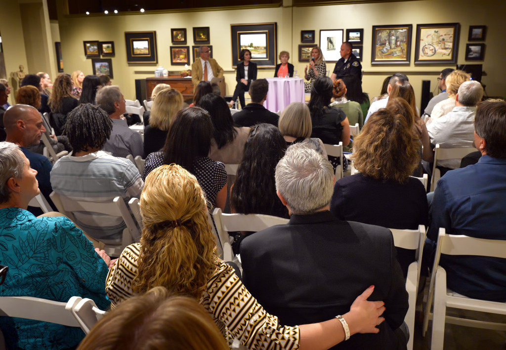 Panel discussion on domestic violence at the opening of the Voices exhibit at the Randy Higbee Gallery in Costa Mesa. Photo by Steven Georges/Behind the Badge OC