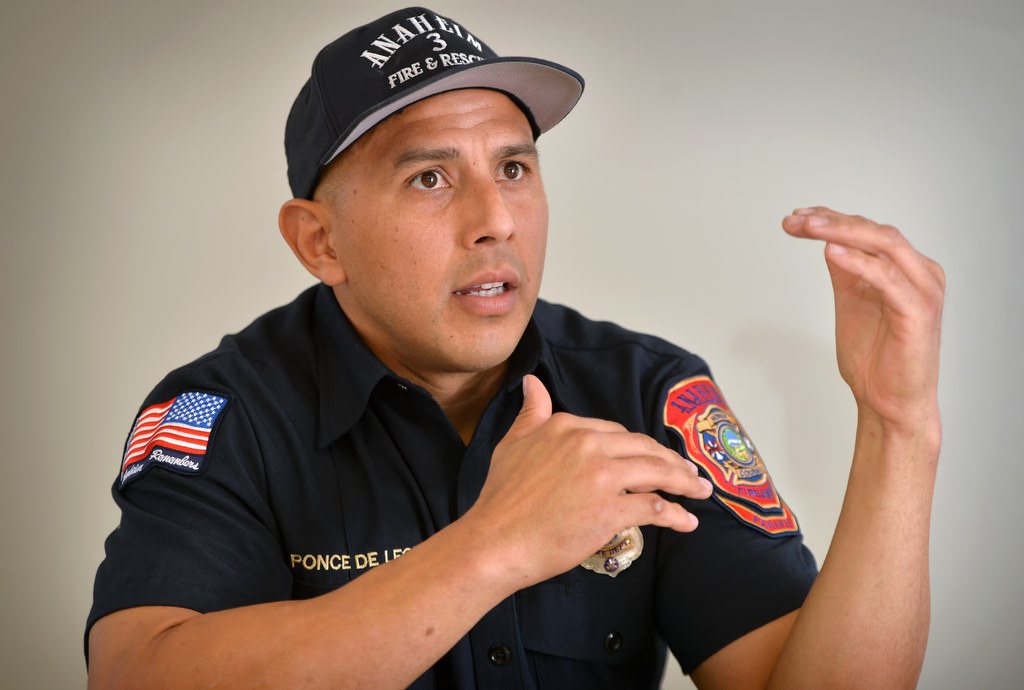 Anaheim Fire & Rescue Firefighter Manny Ponce de Leon talks about the upcoming 25th Annual Scott Firefighter Stairclimb in Seattle. Photo by Steven Georges/Behind the Badge OC