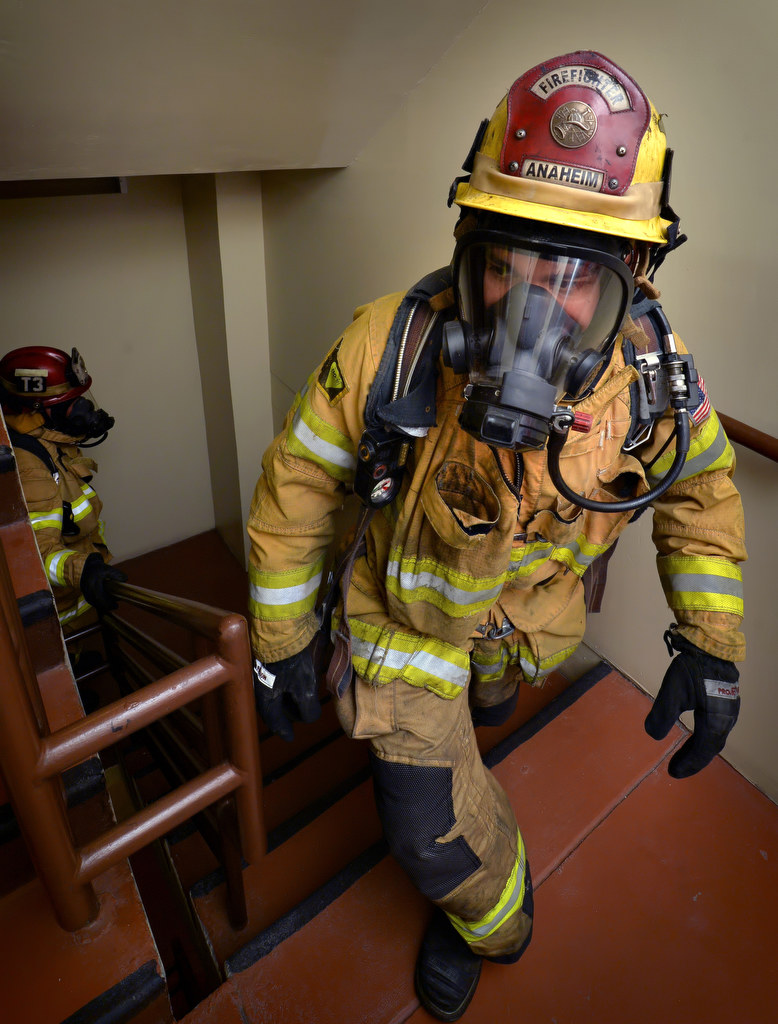 Anaheim Fire & Rescue Firefighter Jericho Olmedo takes the steps at the Anaheim Marriott as they prepare for the upcoming Scott Firefighter Stairclimb in Seattle. Photo by Steven Georges/Behind the Badge OC