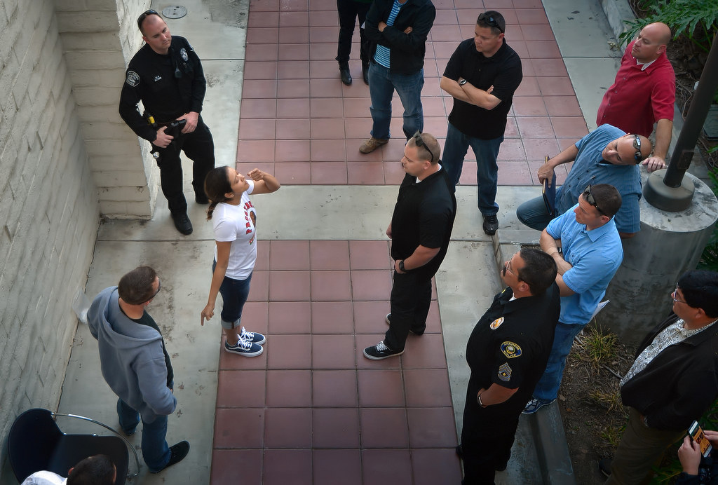 Volunteer Victoria Rangel is given a sobriety test from officers during the Fullerton PD Wet Lab for Drug Recognition Expert program. The blood alcohol level of each volunteer is kept a secret from officers during the various tests. Photo by Steven Georges/Behind the Badge OC