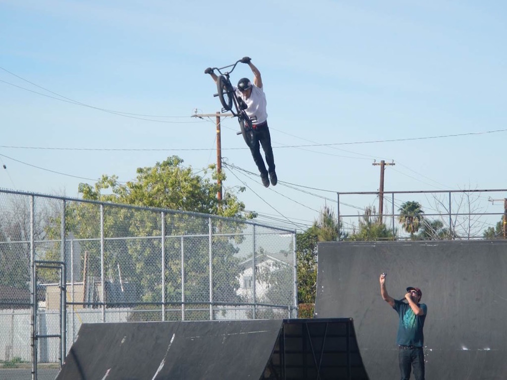 BMX Team Soil pulled out many high-flying tricks to impress middle schoolers in La Habra as part of a program to promote bicycle safety. Photo by Sgt. Jim Tigner/La Habra PD