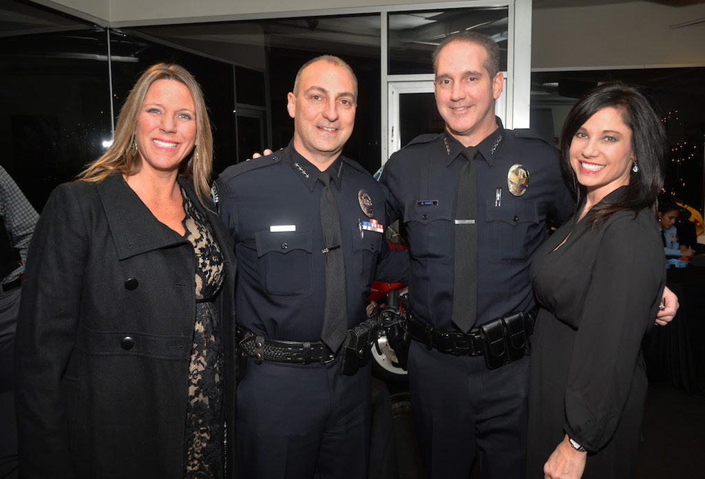 Tustin Police Chief Charles Celano with his wife and Irvine Police Chief Mike Hamel with his wife Fullerton PD Sgt. Kathryn Hamel. Photo by Steven Georges/Behind the Badge OC