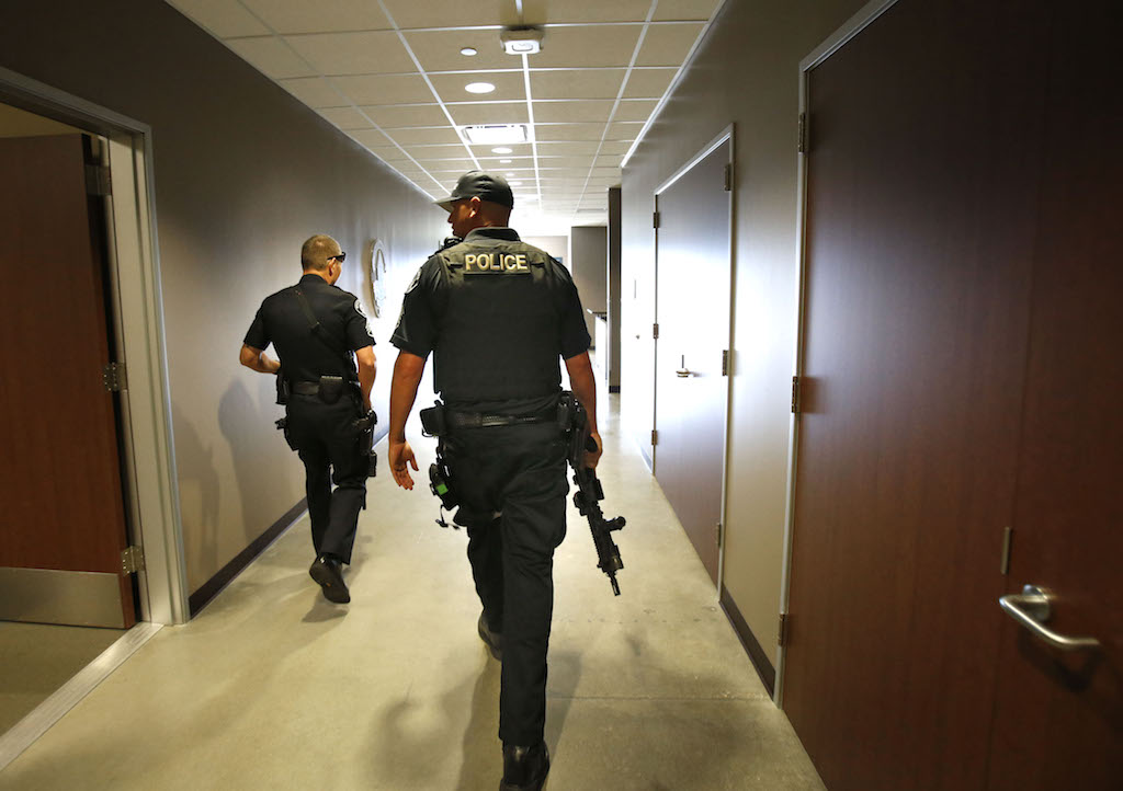 Westminster Police Department Sgt. Cord Vandergrift, right, and Sgt. Mark Lauderback are on the lookout during an active shooter drill in conjunction with the OC Fire Authority.  Photo by Christine Cotter/Behind the Badge OC 