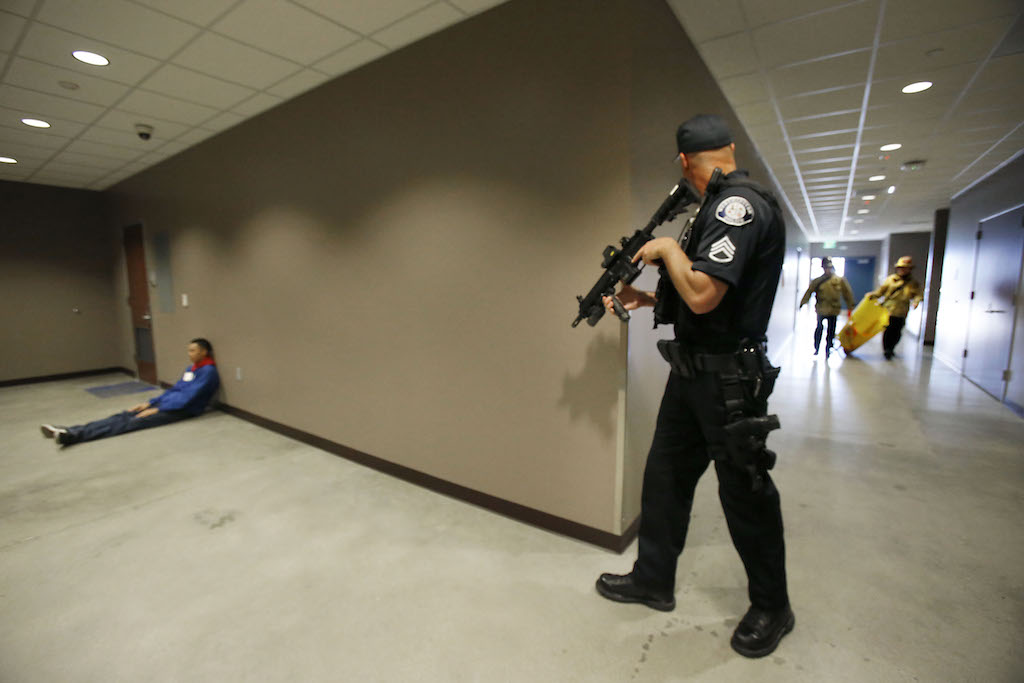 Westminster Police Department Sgt. Cord Vandergrift is on the alert during an active shooter drill in conjunction with the OC Fire Authority.  Photo by Christine Cotter/Behind the Badge OC