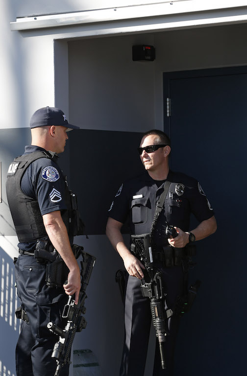 Westminster Police Department Sgt. Cord Vandergrift, left, and Sgt. Mark Lauderback prepare for an active shooter drill in conjunction with the OC Fire Authority.  Photo by Christine Cotter/Behind the Badge OC
